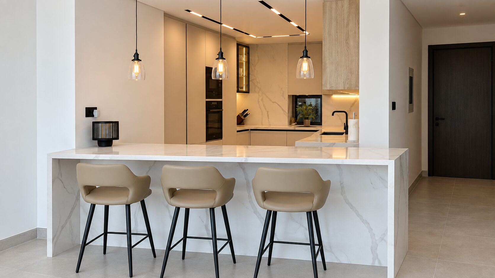 Modular kitchen in Dubai Hills — marble waterfall island with pendant lighting